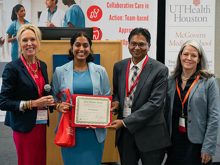 Goering, Cheruvu, Holmes and Aparasu holding certificate