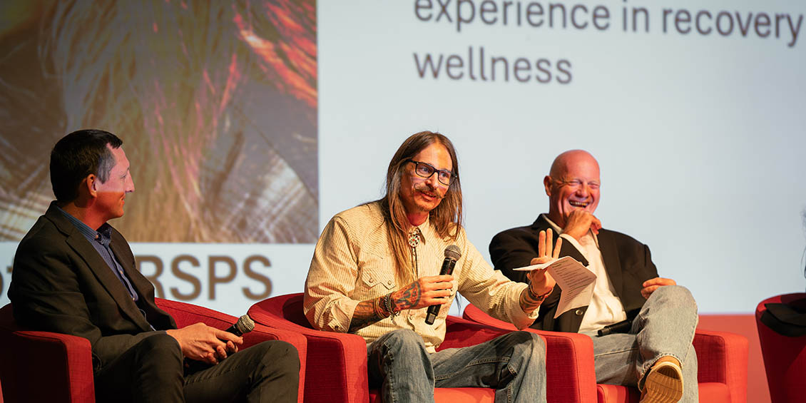 panelists on stage