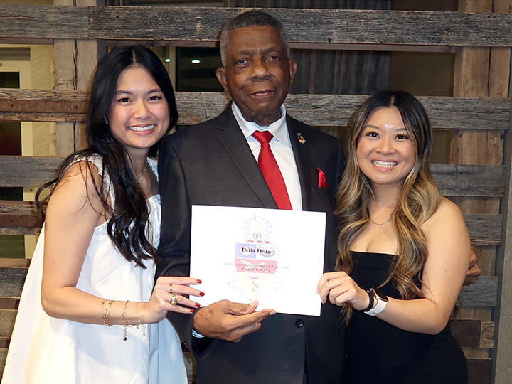 Pham, Williams and Tran hold award