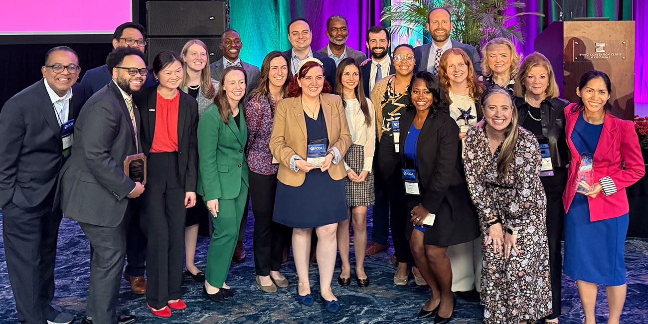 Group photo of The Houston Program alumni, mentors and supporters