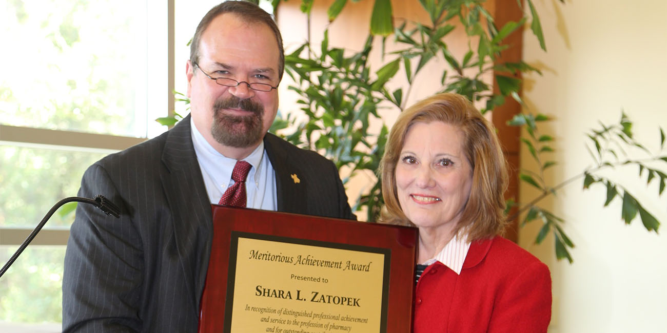 Zatopek and Pritchard with award