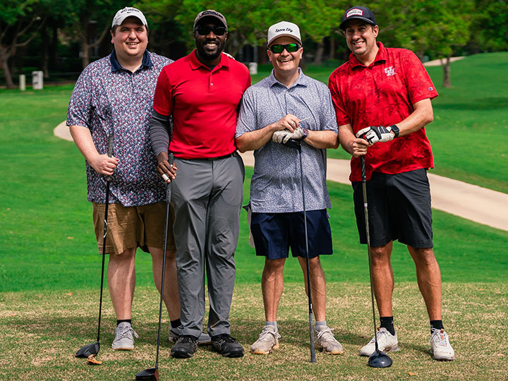 golfers on course