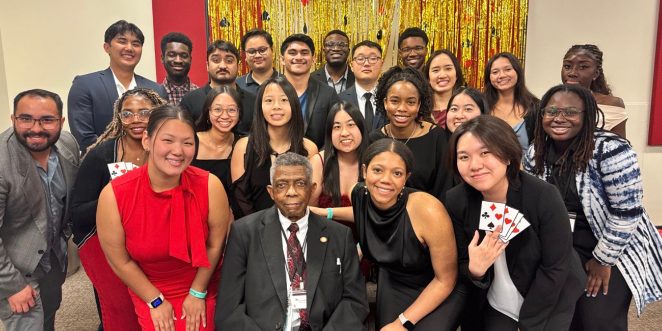 Kappa Psi Delta Delta chapter members and faculty advisor Williams