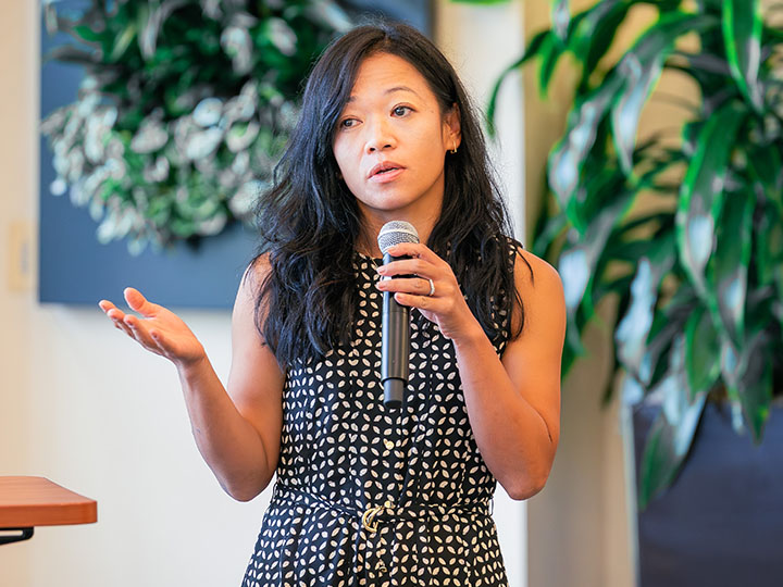 Nguyen speaking at podium