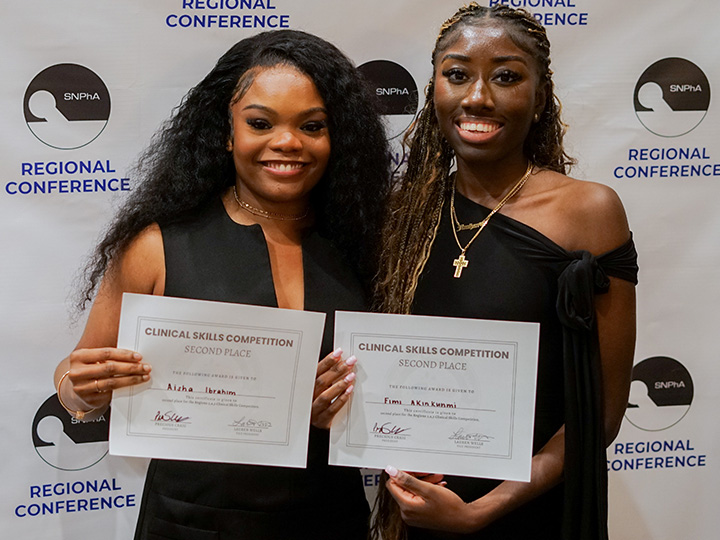 Ibrahim and Akinkunmi with certificate