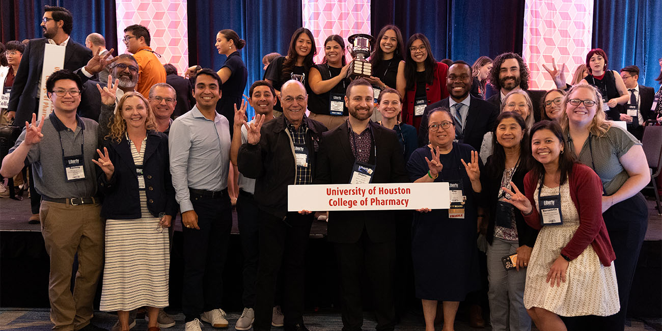 students, alumni, faculty and staff celebrate win