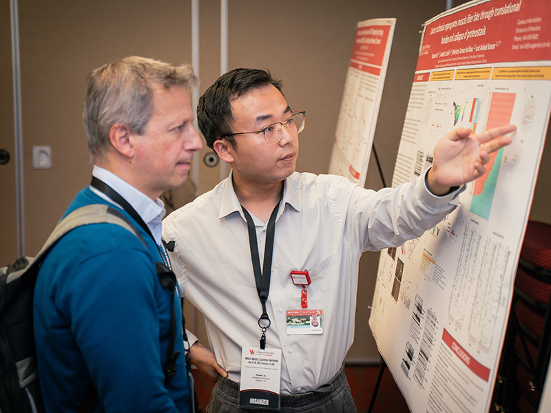 Poster session with student and professor