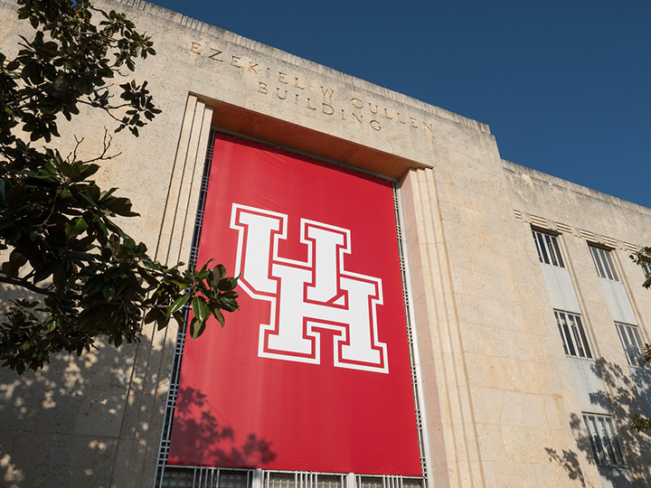 exterior of E Cullen building with UH banner
