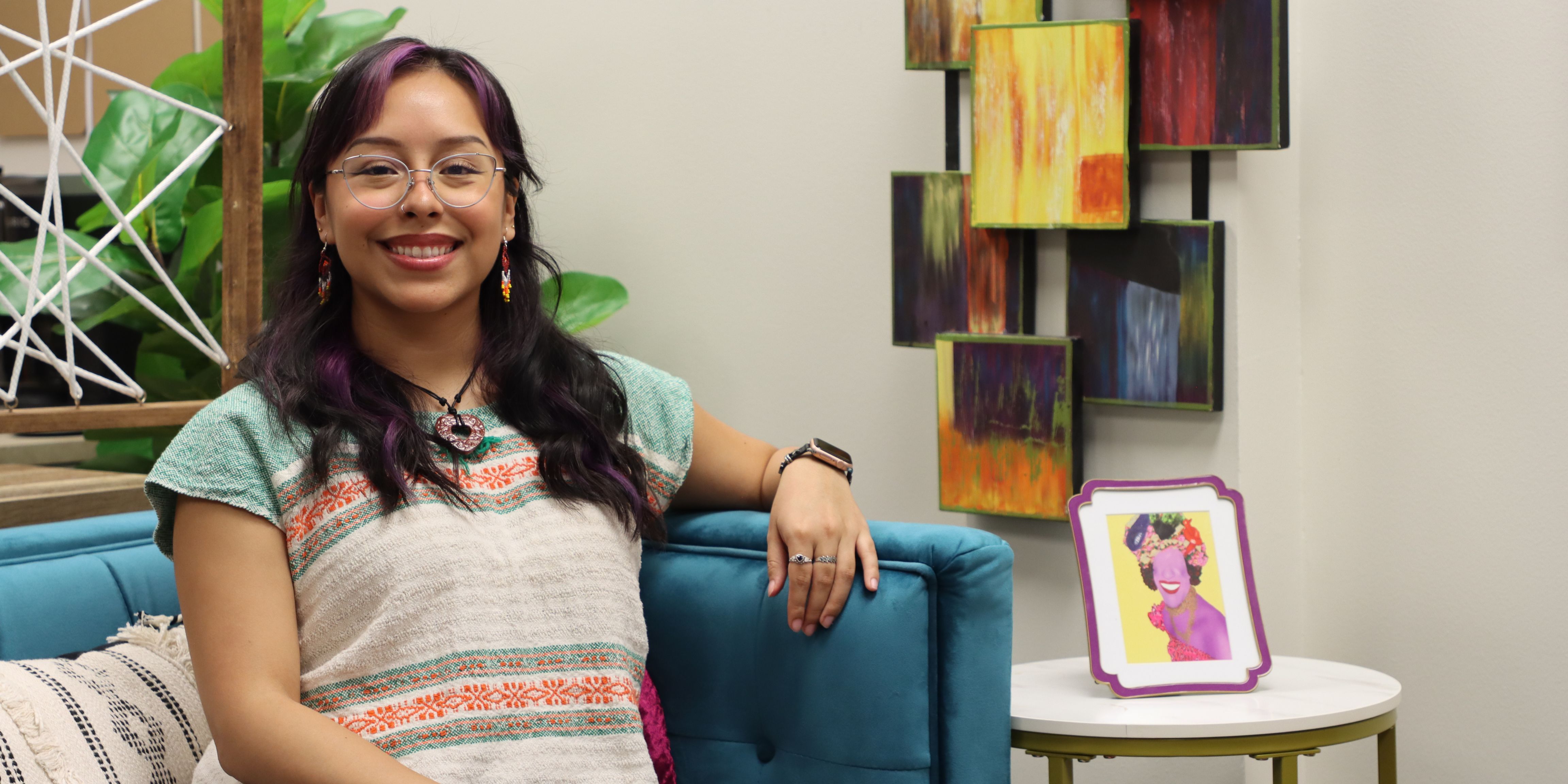 Photo of Frida Quiroz smiling at the camera.