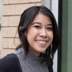 Portrait of a raven-haired woman smiling